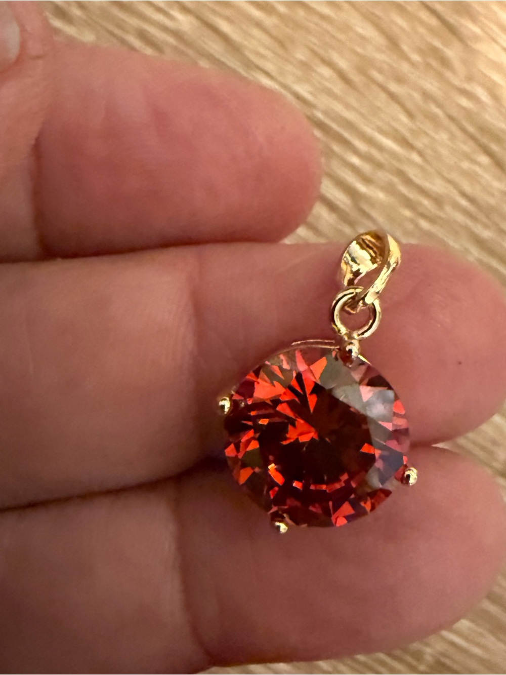 Gold Pendant Necklace with Deep Red Round Crystal